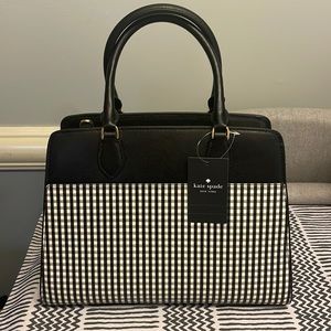 Kate spade new with tags bag with shoulder strap.